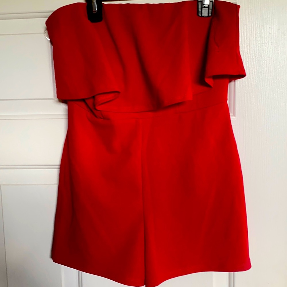New without tags . Size small red romper